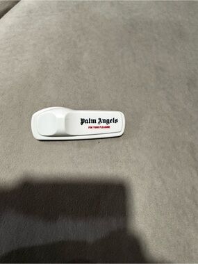 Palm Angels White Ceramic pin with Black Logo and Red Text